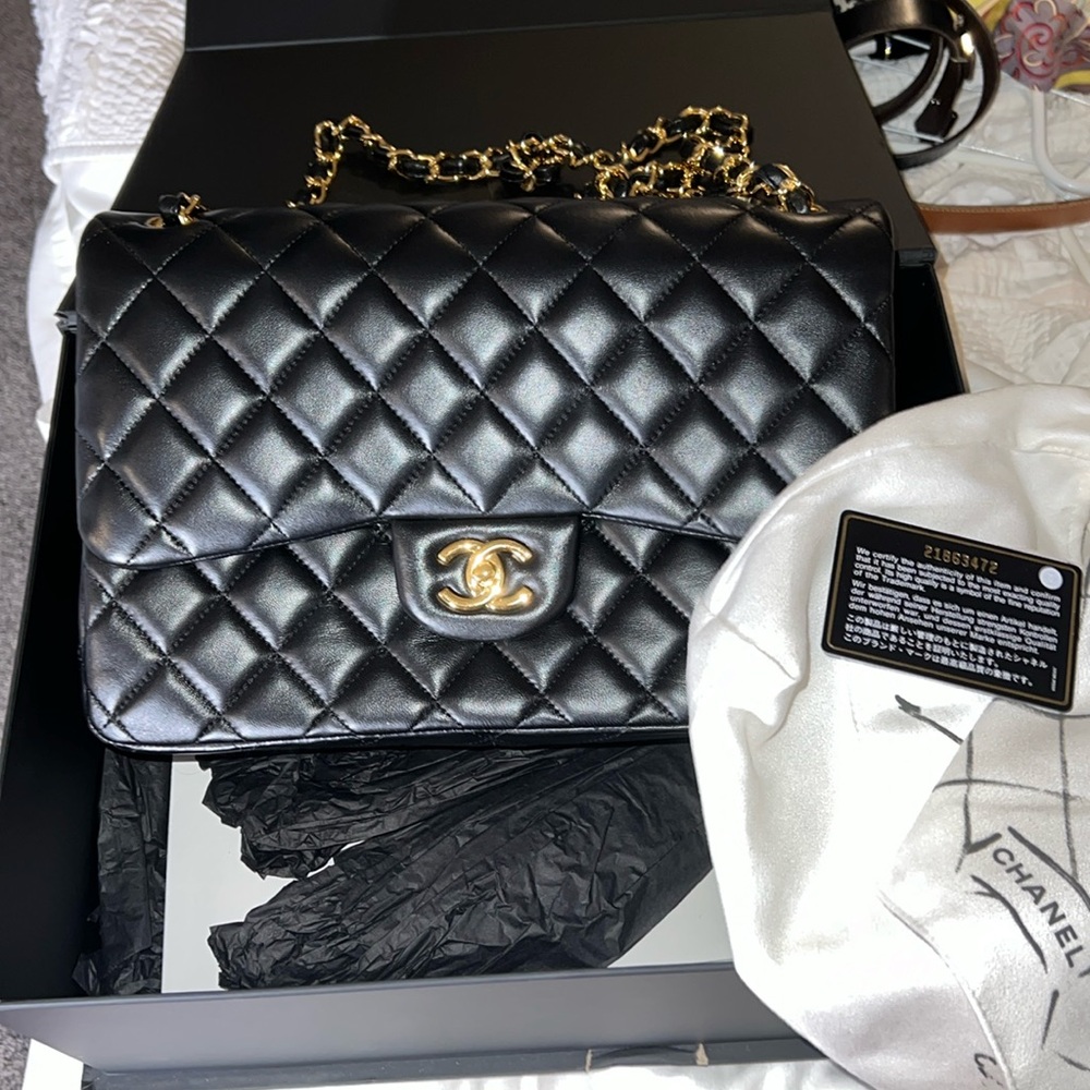 Chanel classic jumbo double flap bag lambskin with gold chain.